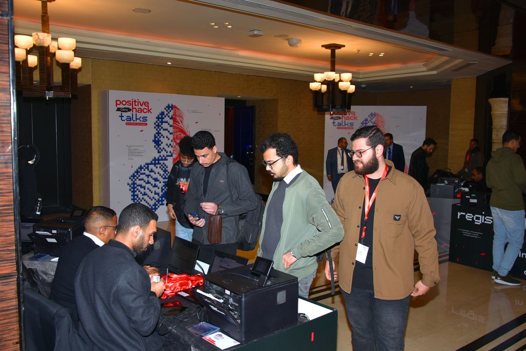 Attendees checking in at the registration desk