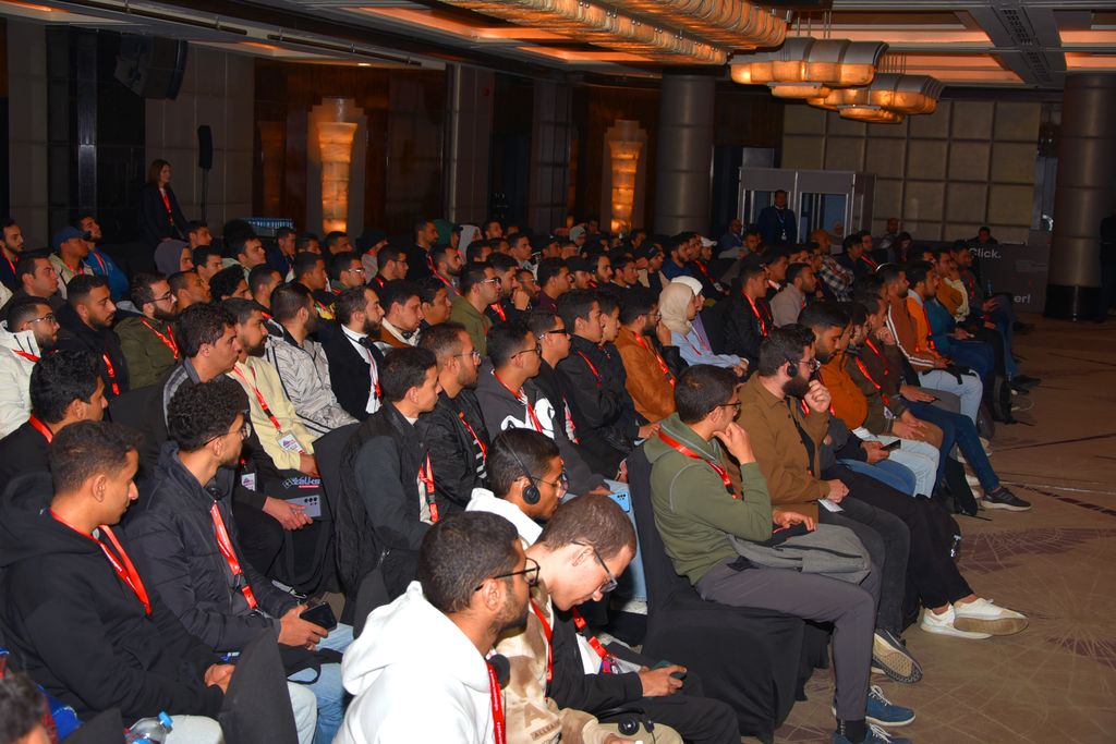 Attendees listening to a talk