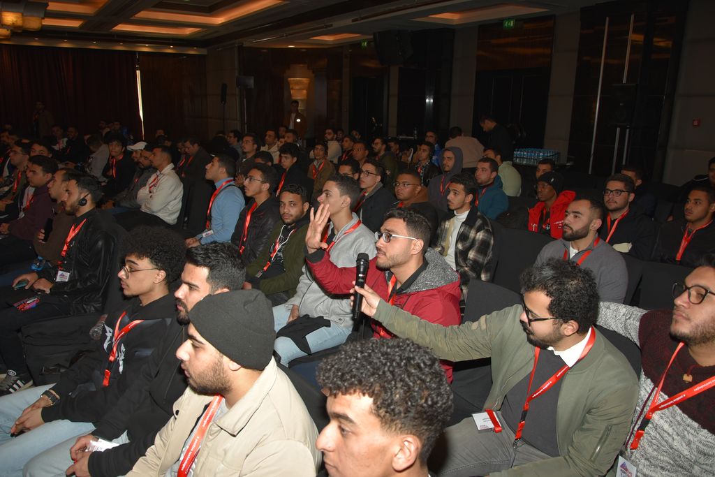 An attendee asking a question from the audience