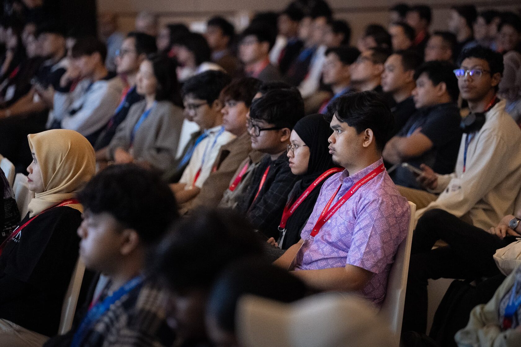 Positive Hack Talks community event — audience in the hall